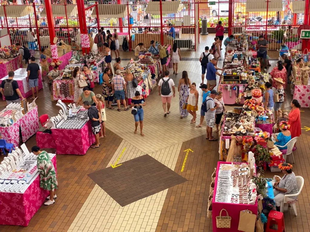 Stalls of fruit, flowers and crafts inside Papeete Market