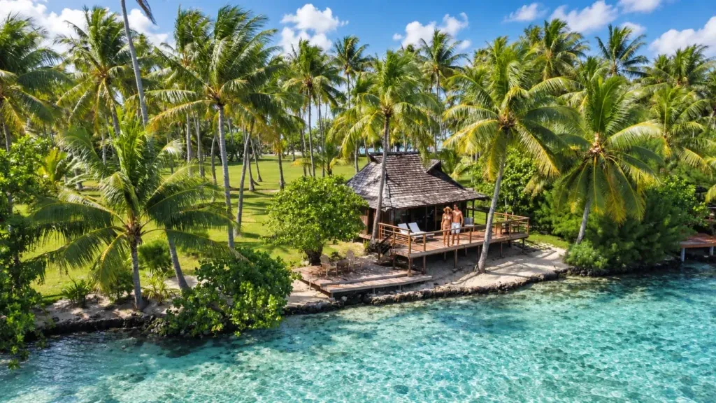 Aerial view of Vahine Private Island and its bungalows on the Taha'a reef